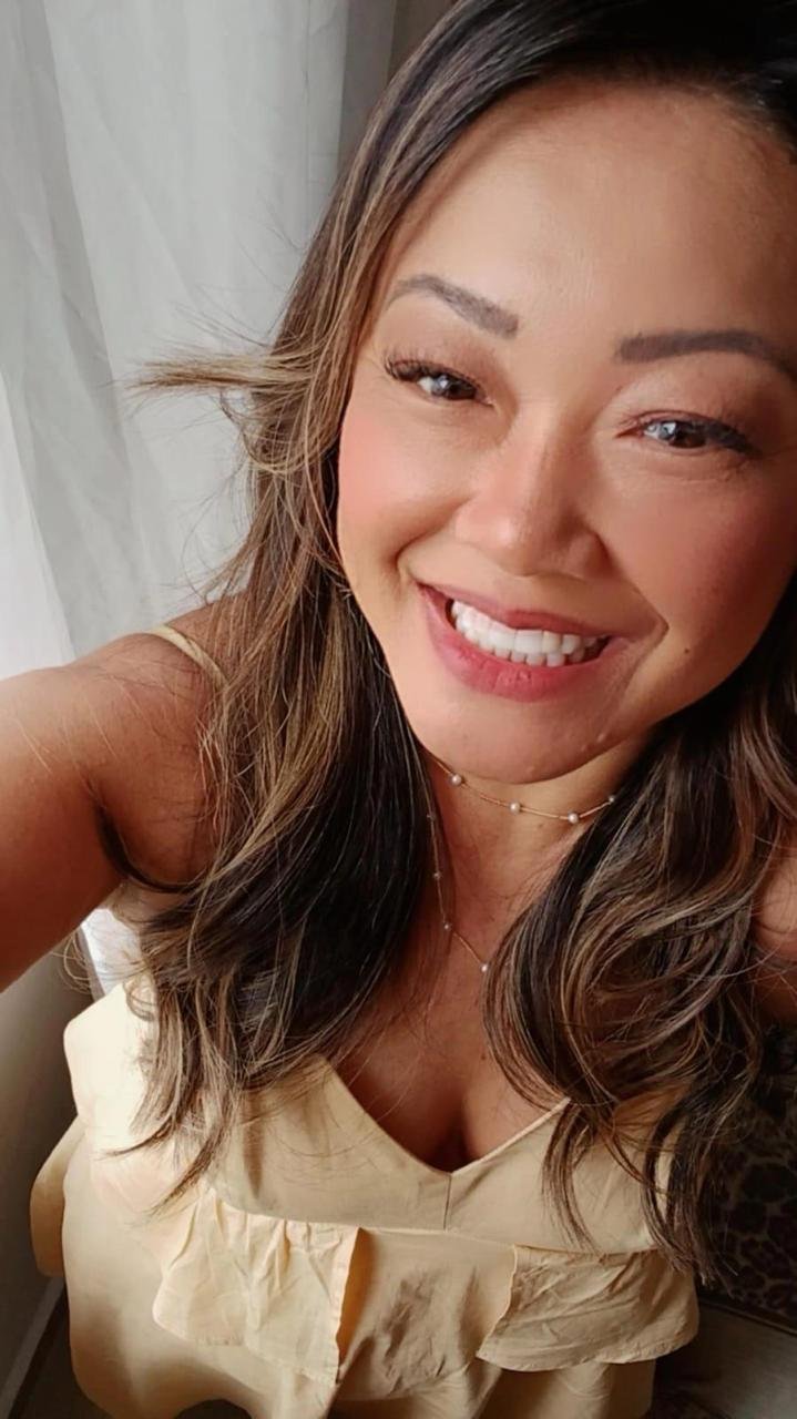 Dra. Cristiane Midori - Dentista